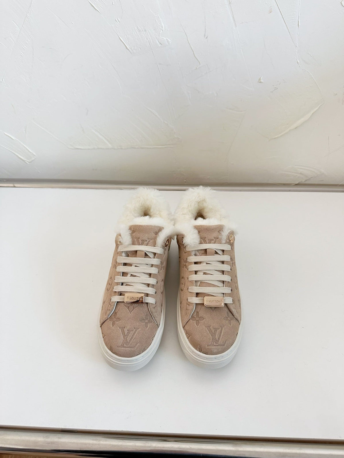 TIME OUT SNEAKER IN DESERT BROWN MONOGRAM EMBOSSED SUEDE WITH FLEECE LINING